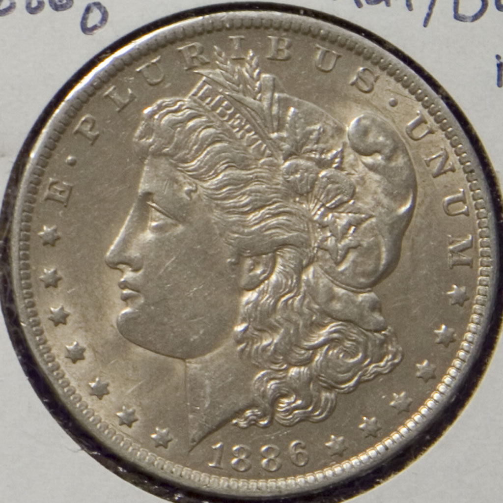 Morgan Dollar — 1886-O (AU)