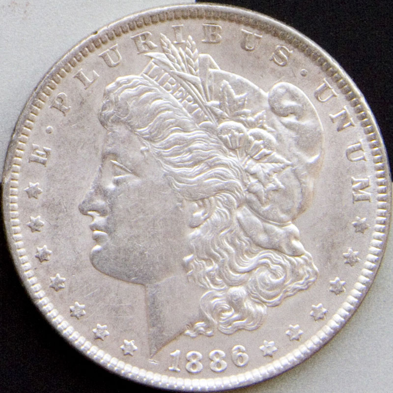 Morgan Dollar — 1886-P (AU)