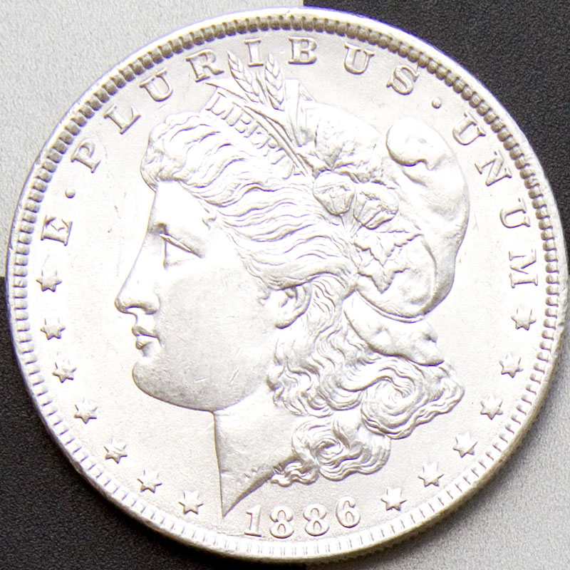 Morgan Dollar — 1886-P (AU)
