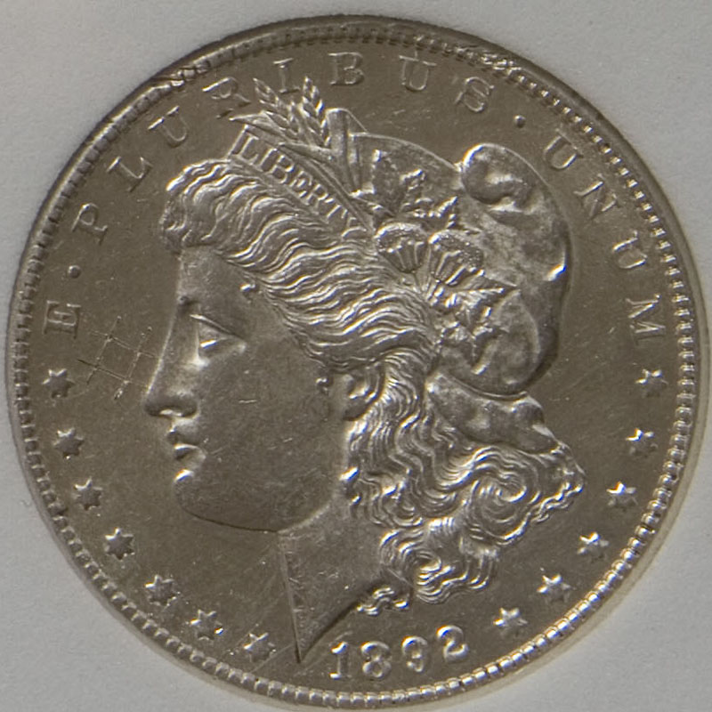 Morgan Dollar — 1892-CC (AU58)